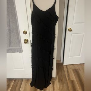 Black dress with diagonal ruffles